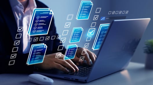 laptop monitor showing check boxes and documents representing Data Quality Tools in the credential platform