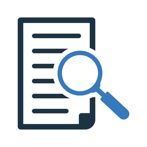 maginfying glass on a paper graphic since admins can audit physical credentials