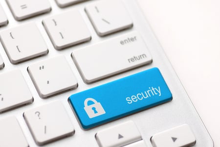 blue security button on keyboard to represent reporting capabilities for digital custody history